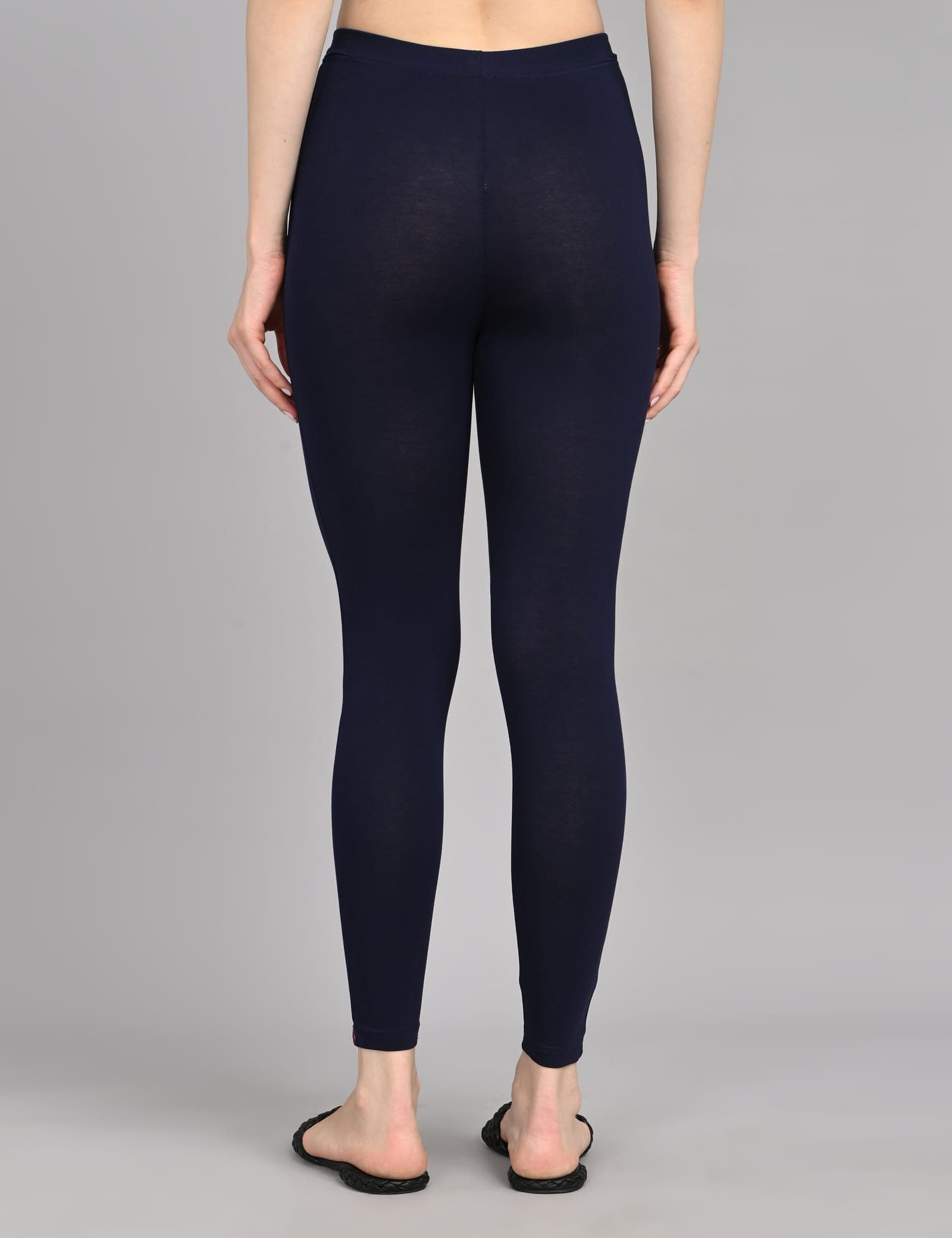 Navy ankle-length leggings, back view